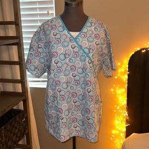 SOLD on WN  blue , pink lavender, white and black, circular design, scrubs,